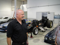 Grant welcoming the CRs to Del Worsham's Funny Car shop